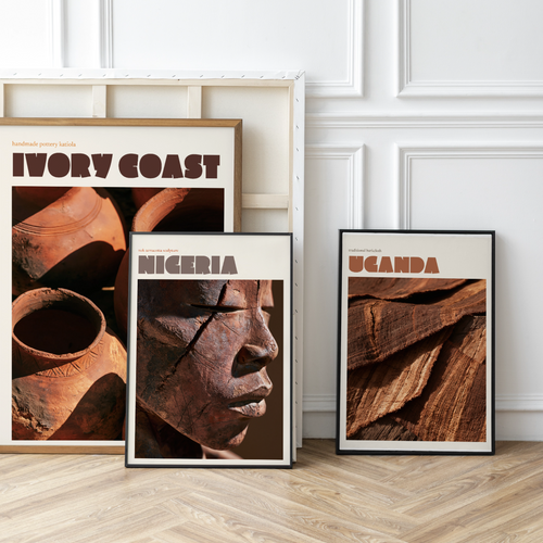 Three framed travel art posters depicting Ivory Coast, Nigeria, and Uganda, arranged on a light wood herringbone floor against a white paneled wall.